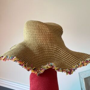 Toddler girls size small straw beach hat with colorful trim.